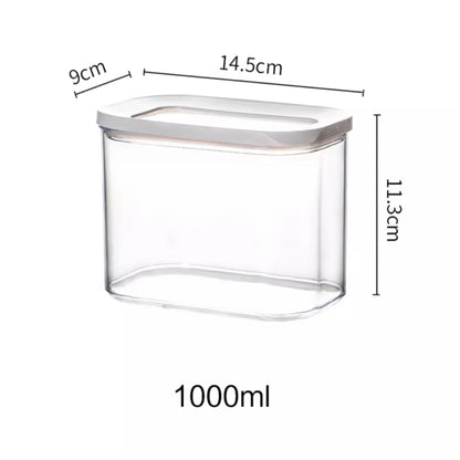 Transparente Vorratsdose mit einem Fassungsvermögen von 1000 ml, Maße: 9 cm Breite, 14,5 cm Länge und 11,3 cm Höhe. Der Deckel ist weiß und schließt sicher, um den Inhalt frisch zu halten. Ideal für die Aufbewahrung von kleineren Mengen Trockenlebensmitteln und zur platzsparenden Organisation in der Küche.